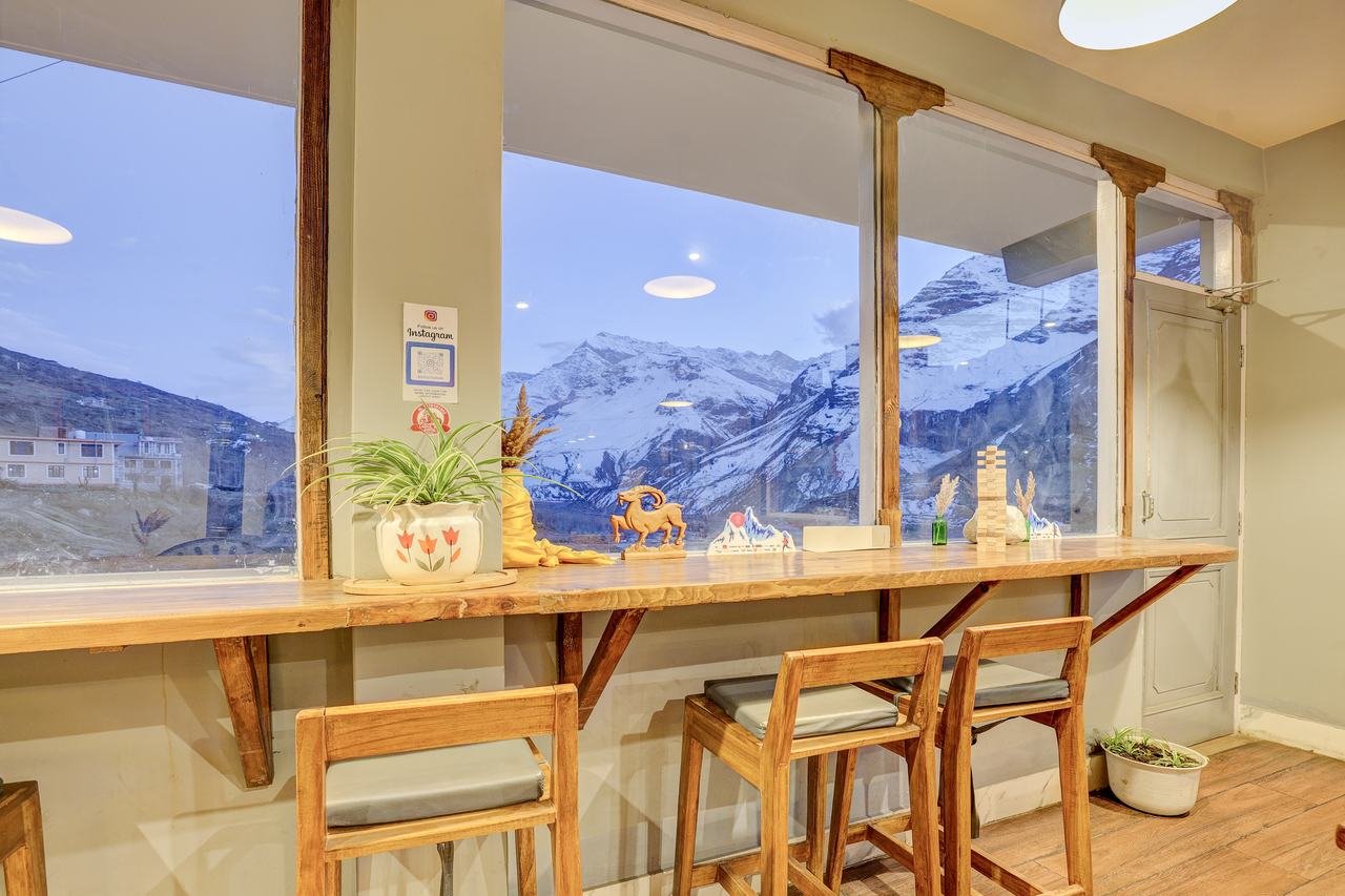Oven Xpress mountain-view seating at Utpala House