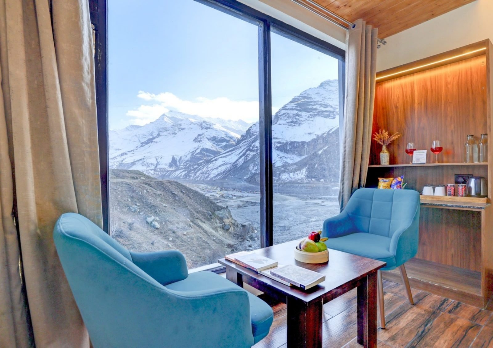 Mountain view balcony seating at Utpala House Sissu