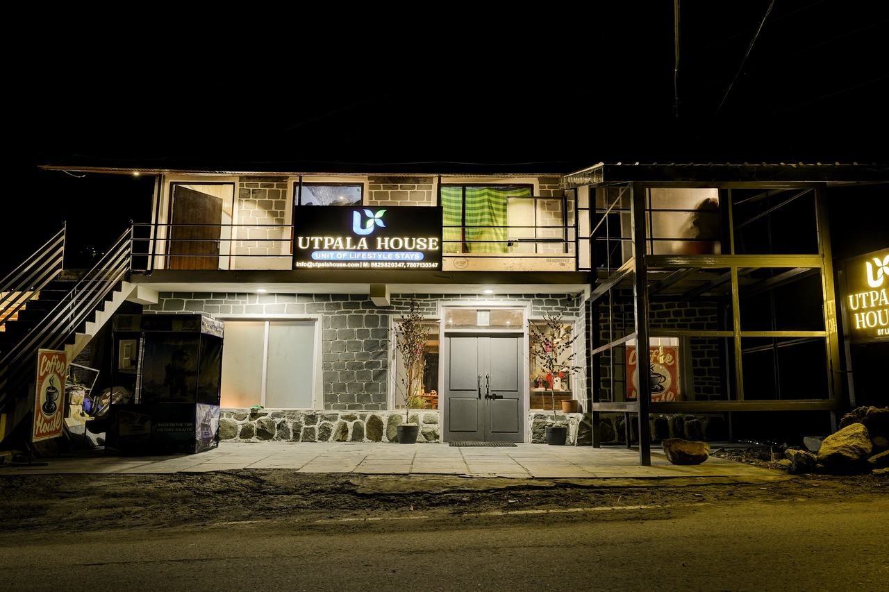 Utpala House Sissu exterior at night