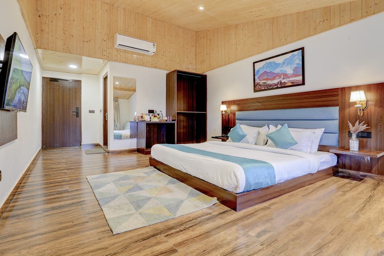 Deluxe Attic Room under sloped wooden roof